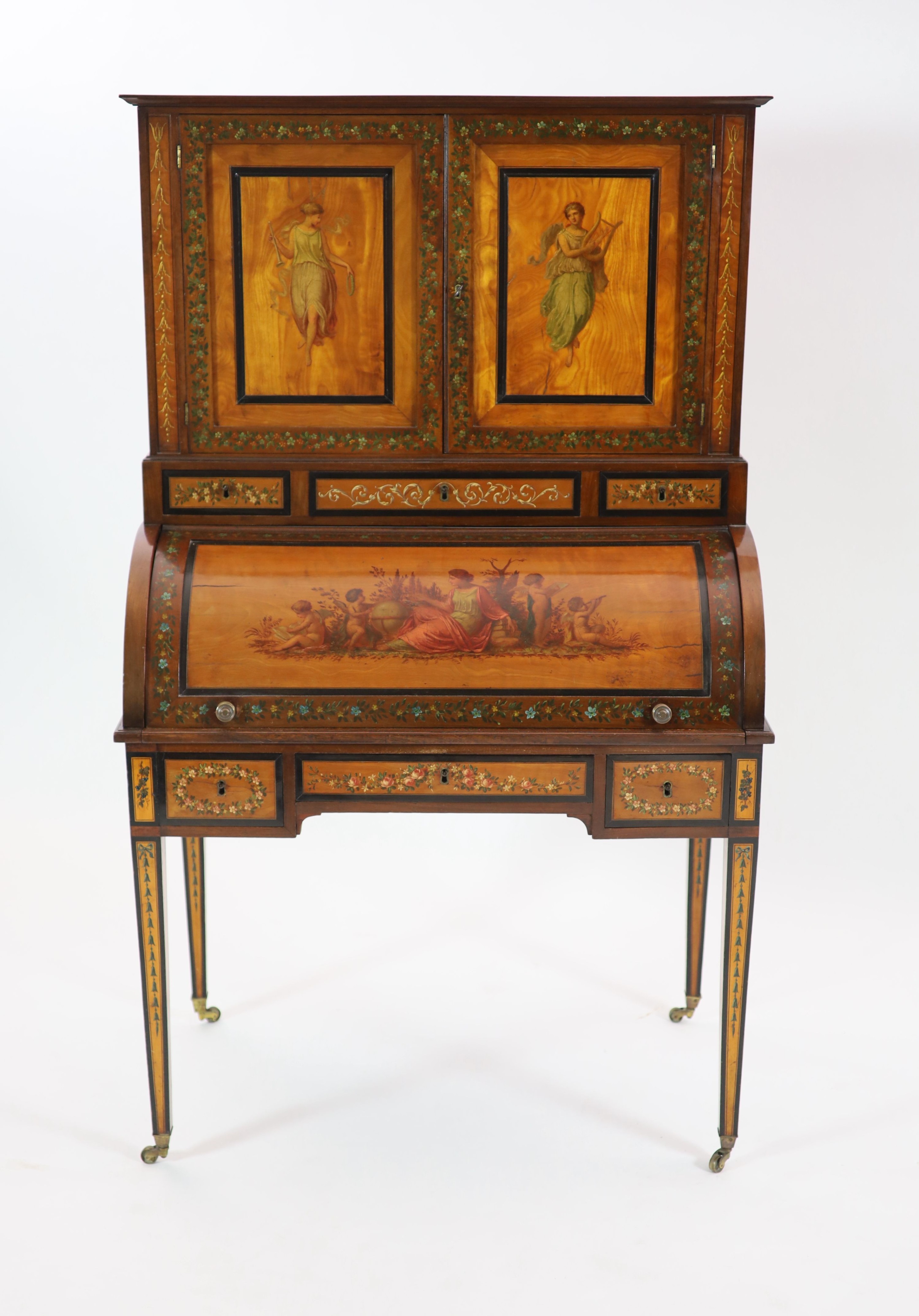 An Edwardian Sheraton Revival painted satinwood cylinder bureau / bonheur du jour H 162cm. W 97cm. D 58cm.